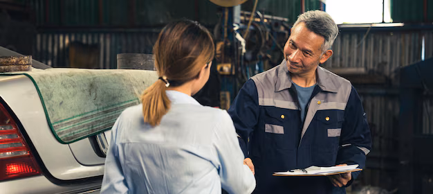 mechanic-technician-making-handshake-deal-with-business-customer-auto-car-garage-service-workshop-occupation-automobile-maintenance-repair-adult-industry-worker-greeting-client-agreement